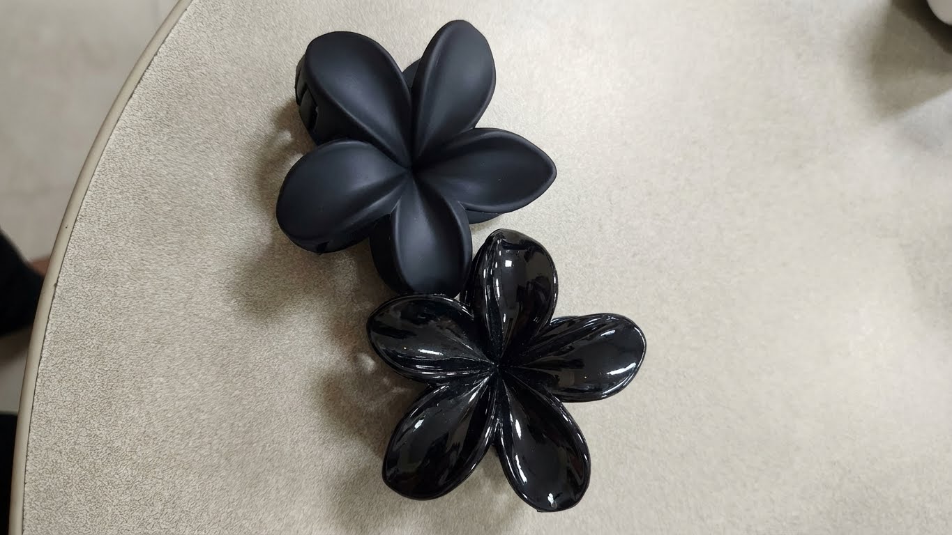 مشبك شعر زهرة أسود أنيق