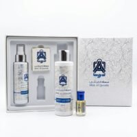 Misk Al Qurashi luxury body care gift set featuring body lotion, body spray, and concentrated oil perfume in a white presentation box.
