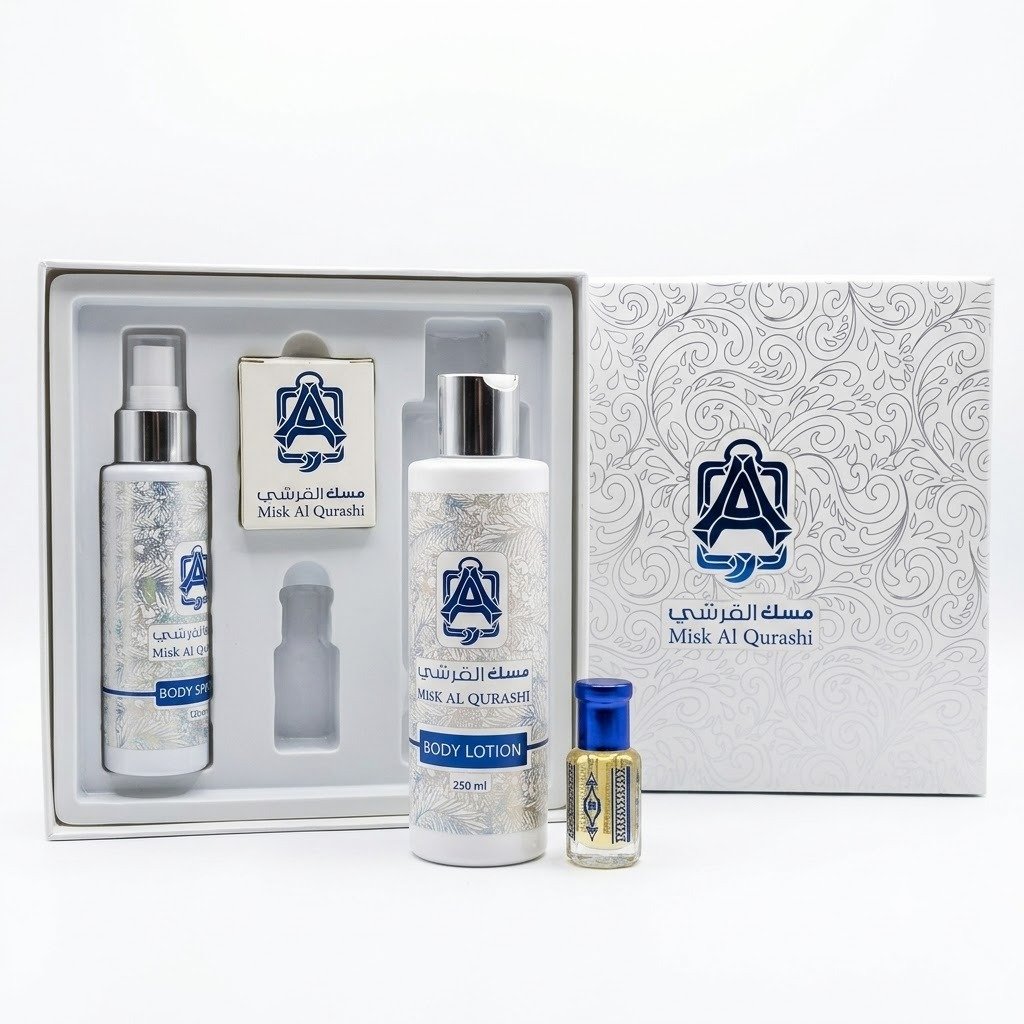 misk-al-qurashi-body-care-gift-set Misk Al Qurashi luxury body care gift set featuring body lotion, body spray, and concentrated oil perfume in a white presentation box.