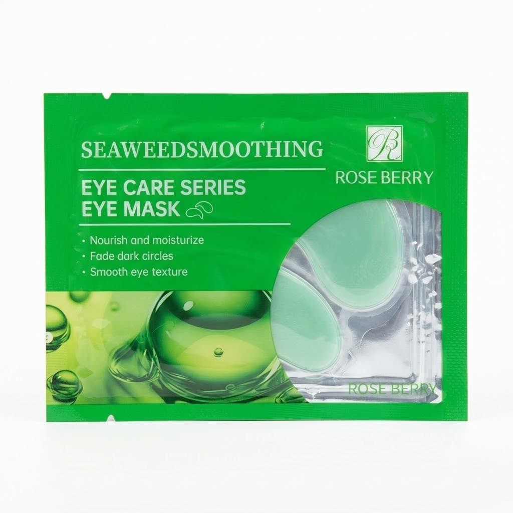 طقم ماسكات هيدروجيل للعناية بمحيط العينين من روز بيري Rose Berry - 4 أنواع متنوعة Rose Berry Eye Care Series Hydrogel Eye Mask Set - 4 Variants Rose Berry Seaweed Smoothing Eye Mask sachet with green bubbles illustration and a clear window showing the green hydrogel under-eye patches.