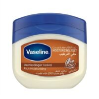 Home Vaseline Cocoa Butter Moisturizing Jelly tub featuring a blue flip-top lid, a brown front label with Arabic and English text, and a cocoa bean illustration on a white background.